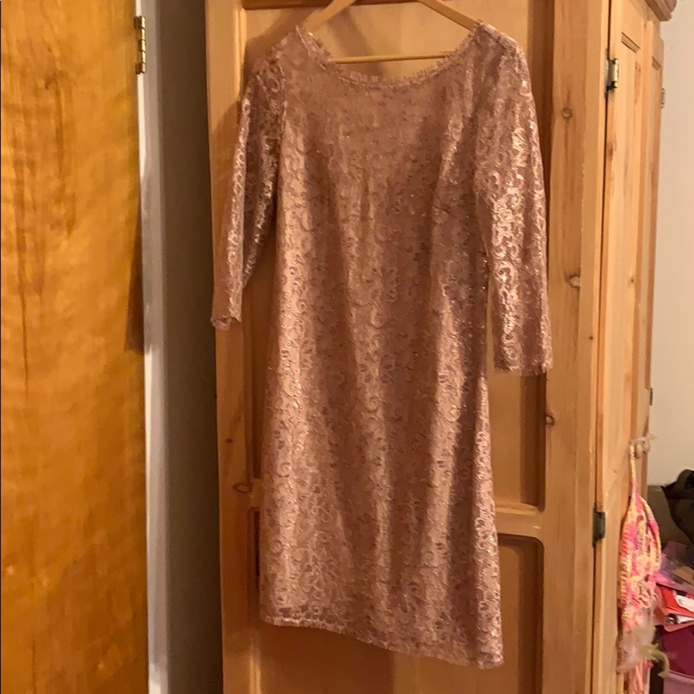 Lace sparkly mini dress with v back.